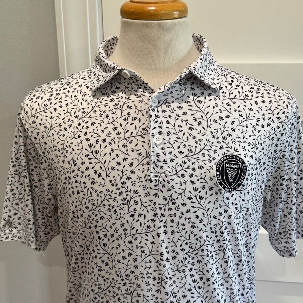 Inter Miami FC Performance Polo Shirt. Medium. Black/White floral print.